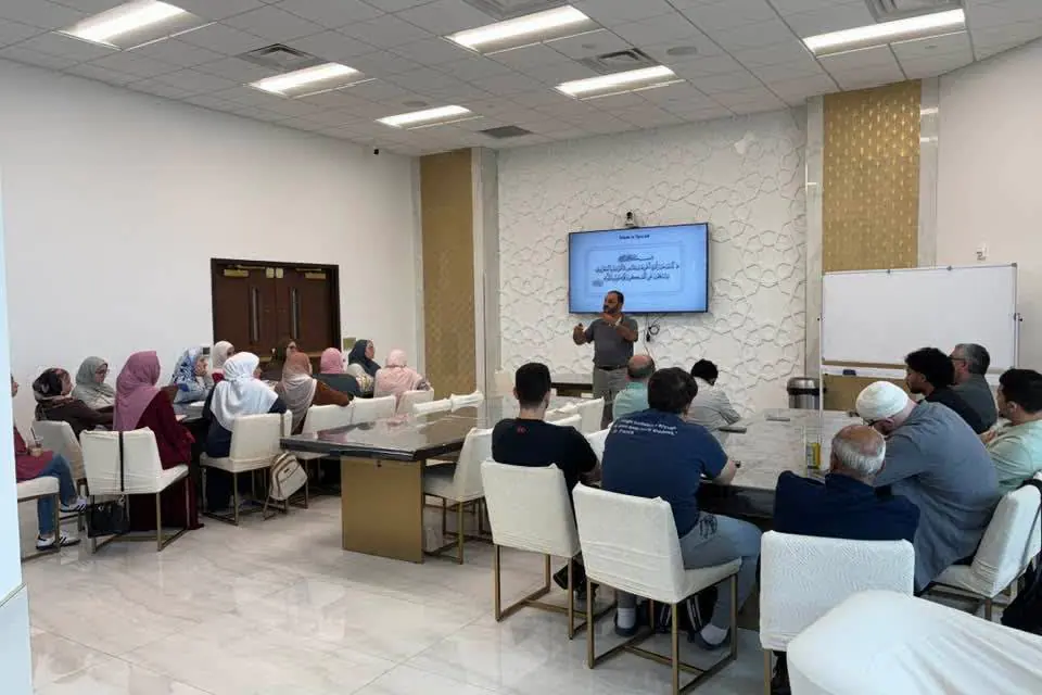 Brothers and sisters listening to a monthly Seerah lecture